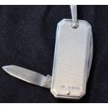 An Elizabeth II silver pocket utility penknife, with blade, screwdriver and bottle opener,