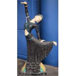 An Art Deco style resin figure, of a dancing girl, marble plinth,