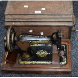 A Singer manual sewing machine,