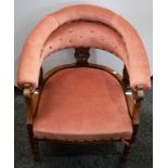 A late 19th early 20th century mahogany tub chair, open arm,