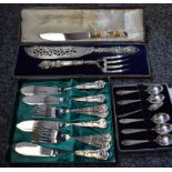 A boxed set of silver plated fish servers; a Royal Crown Derby cake knife,