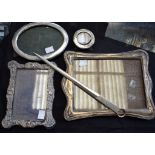 A George V silver oval easel photograph frame, Birmingham 1918; others,