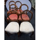 A set of four Victorian design balloon back side chairs; a pair,