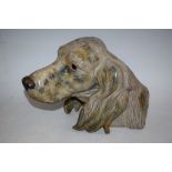 A Lladro terracotta bust of a dog, naturalistically modelled, glazed in mottled shades of grey,