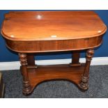 A Victorian mahogany side/console table, moulded top above a deep frieze,