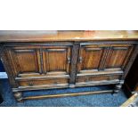 A Flemish inspired oak sideboard,