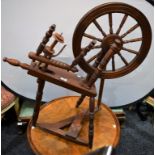 A Country Cottage style spinning wheel