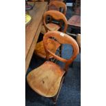 A composed set of seven Victorian balloon back farmhouse kitchen chairs (7)