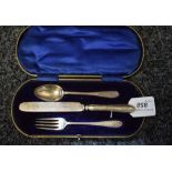 A George V silver three piece christening set, comprising fork, spoon and knife, Sheffield 1915-16,