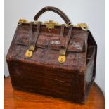 A large crocodile effect leather Gladstone bag,