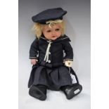 An Armand Marseille 966 composition character doll, flirty brown eyes, open mouth with two teeth,