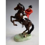 A Beswick Huntsman on a rearing horse