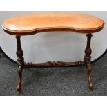 A Victorian walnut and mahogany kidney shaped centre table, moulded top,