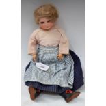 An Armand Marseille 390 bisque socket head doll , sleeping brown eyes, open mouth with teeth,