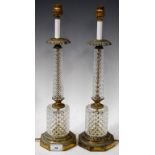 A pair of 'diamond cut' glass and brass table lamps (2)