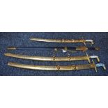 A collection of decorative reproduction Eastern swords (4)