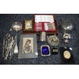 A four piece French horn carving and serving set, boxed; a set of silver plated lobster picks,