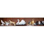 A Beswick model of a dog, Champion Ruler of Ouborough; a Franklin Mint model of a swan, 30cm wide,