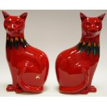 A pair of Poole mantel cats in red