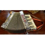 A Bonelli piano accordion 16 bass buttons