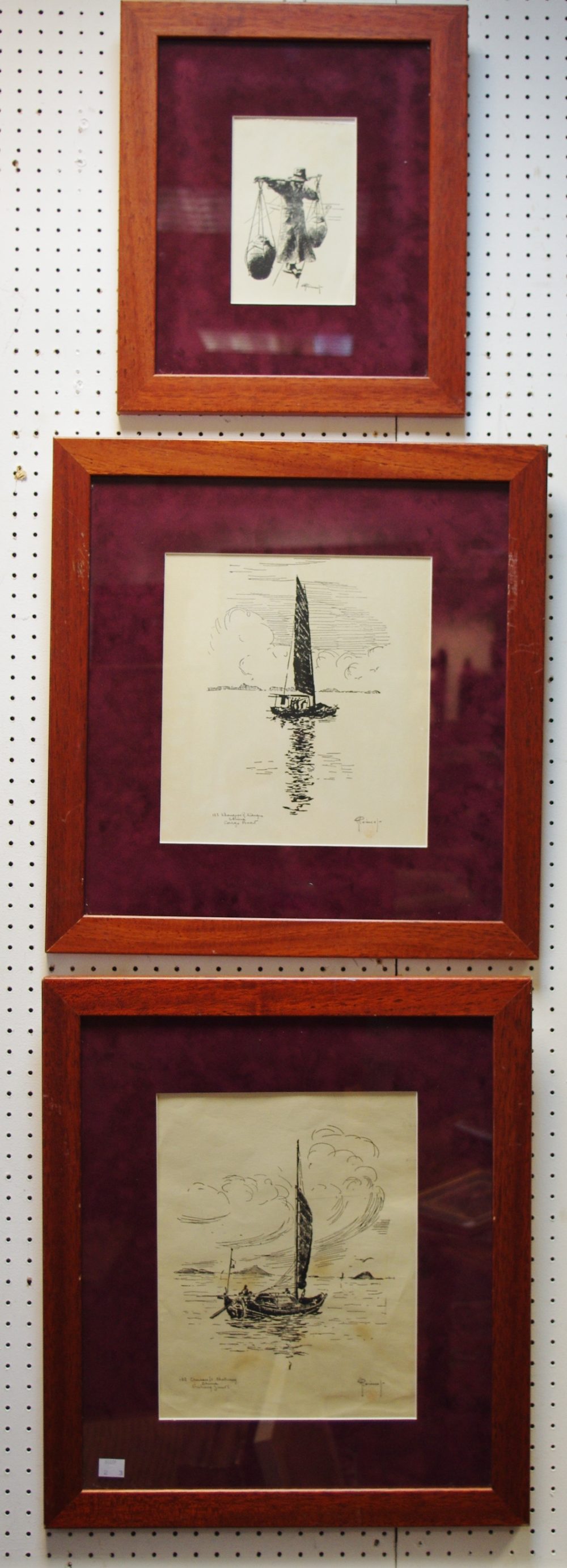 A set of three framed prints signed,China Cargo Boat and China Fishing Junks,