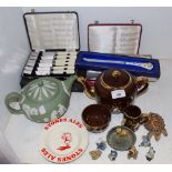 A Wedgwood green Jasperware teapot and cover; an Aynsley cake knife;