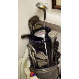 Two half sets of Lady Sayer golf clubs each with Mezuno bag and trolley