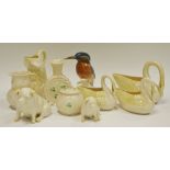 Belleek - a pig, seated; another, smaller, a large swan, green mark; others,