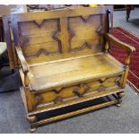 A block fronted oak monks bench,