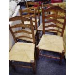 A harlequin set of five Lancashire ladderback rush seated dining chairs( 5)