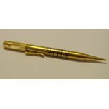 A goldsmiths and Silversmiths Co. 18ct gold propelling pencil 26.6g gross.
