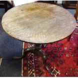 A George III oak tilt top tavern table c.