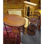 An Edwardian mahogany occasional table, oval top, shaped stretchers, oval undertier,