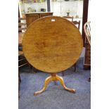 ***Amended Image****A George III oak tripod table, circular top.