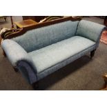 A scroll arm sofa,