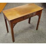 A Chippendale revival mahogany and walnut hall table, rectangular top, short drawer to frieze,
