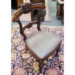 A Victorian mahogany council chamber chair, armorial crest to top rail, shaped horizontal splat,