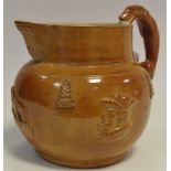 A 19th century salt glazed stoneware Brampton hunting jug, applied decoration, handle as a hound, c.