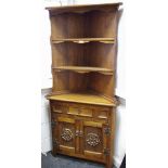 A country oak floor standing corner cabinet, open shelving to top,