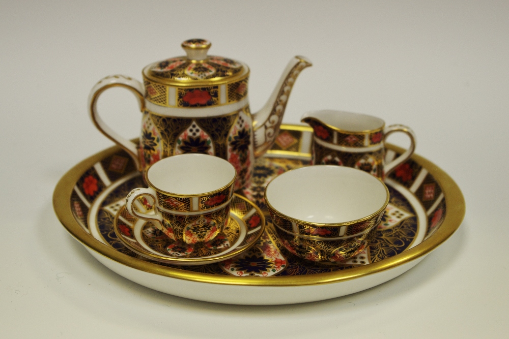 A Royal Crown Derby 1128 pattern miniature coffee set,