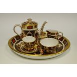 A Royal Crown Derby 1128 pattern miniature coffee set,