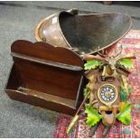 A planished copper coal scuttle,