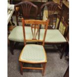 Two mahogany Hepplewhite style dining chairs;