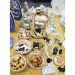 Decorative ceramic cats in a basket; tea for three cat,