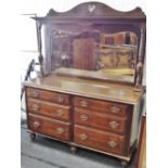 A late Victorian mirror back sideboard, shaped pediment, turned columns and shaped mirror to top,