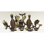 An Austrian novelty bronze model of a comical reclining cat, others, similar, ponies, cockerel,