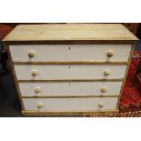 A Victorian pine chest of four long drawers.