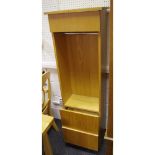 A modern light oak corner cabinet; an oak effect tall storage unit,