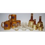 A Bell's blended Scotch Whisky Wade decanter and contents, three others, smaller,