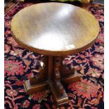 A Titchmarsh & Goodwin oak occasional table, circular top. 46cm high x 43cm diameter.